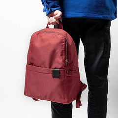 DailyObjects Monkey Shoulder Bag (19L) for Everyday Use| 100% Recycled | Travel/Office Bag | Backpack With Padded Compartment for Upto 14" | Adjustable Straps & Zipper closure - Orange