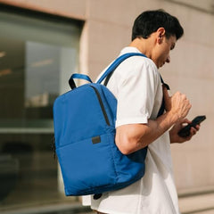 DailyObjects Monkey Shoulder Bag (19L) for Everyday Use| 100% Recycled | Travel/Office Bag | Backpack With Padded Compartment for Upto 14" | Adjustable Straps & Zipper closure - Orange