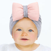 SYGA Plaid Bow Knot Turban Hat for New Born Baby Cap Streachable Toddler Infant Baby Head Wear Hats 0-4 Years (Light Gray (Pink Bow))