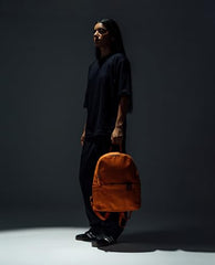 DailyObjects Monkey Shoulder Bag (19L) for Everyday Use| 100% Recycled | Travel/Office Bag | Backpack With Padded Compartment for Upto 14" | Adjustable Straps & Zipper closure - Orange