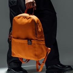 DailyObjects Monkey Shoulder Bag (19L) for Everyday Use| 100% Recycled | Travel/Office Bag | Backpack With Padded Compartment for Upto 14" | Adjustable Straps & Zipper closure - Orange