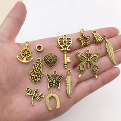 SYGA 100 Pieces Mixed Charms Pendant Charms Craft Supplies for Earrings Necklace Bracelet Jewellery DIY Making (Silver-001)