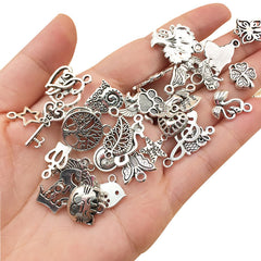 SYGA 100 Pieces Mixed Charms Pendant Charms Craft Supplies for Earrings Necklace Bracelet Jewellery DIY Making (Silver-001)
